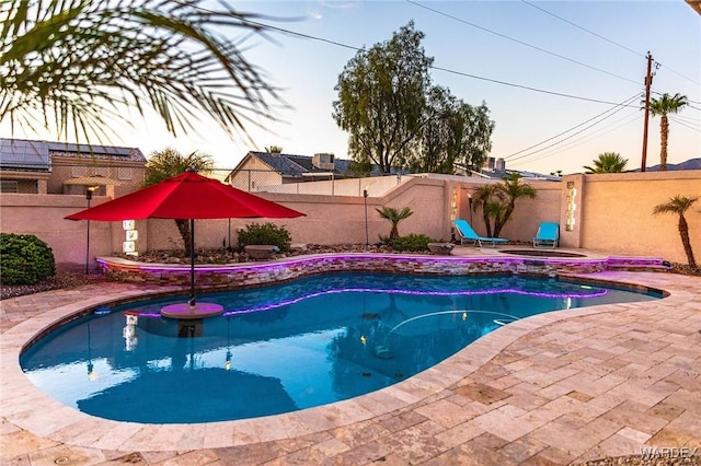 view of pool featuring a fenced in pool, a patio area, and a fenced backyard
