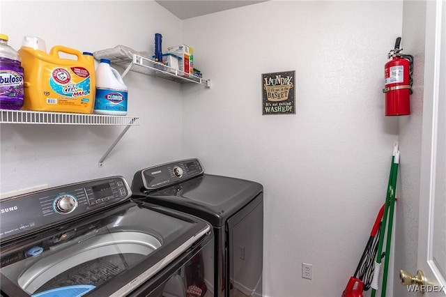 laundry room featuring washer and clothes dryer and laundry area