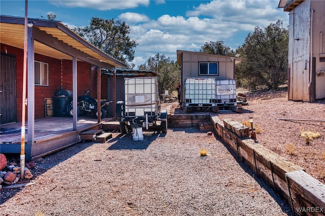 view of yard with a wooden deck