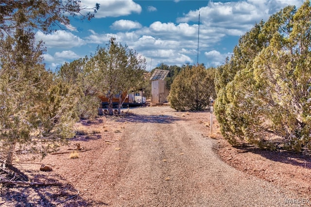 view of road featuring driveway