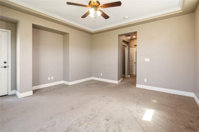 1999 Alan Ladd Dr, Kingman, AZ 86409 - carpeted spare room featuring ceiling fan, ornamental molding, and baseboards