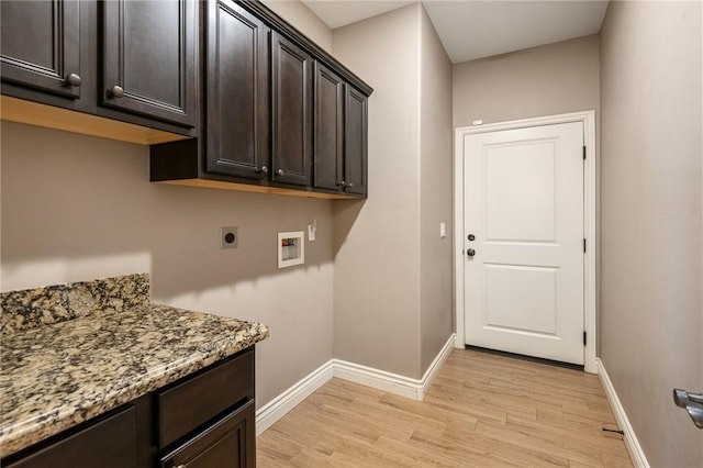 1999 Alan Ladd Dr, Kingman, AZ 86409 - clothes washing area featuring electric dryer hookup, cabinet space, light wood-type flooring, hookup for a washing machine, and baseboards