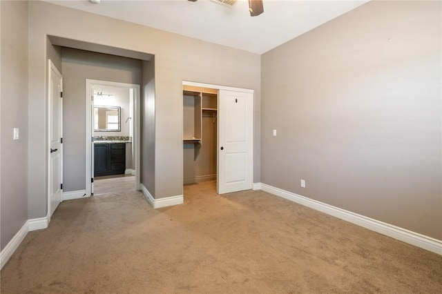 1999 Alan Ladd Dr, Kingman, AZ 86409 - unfurnished bedroom featuring light colored carpet, baseboards, a closet, and a ceiling fan