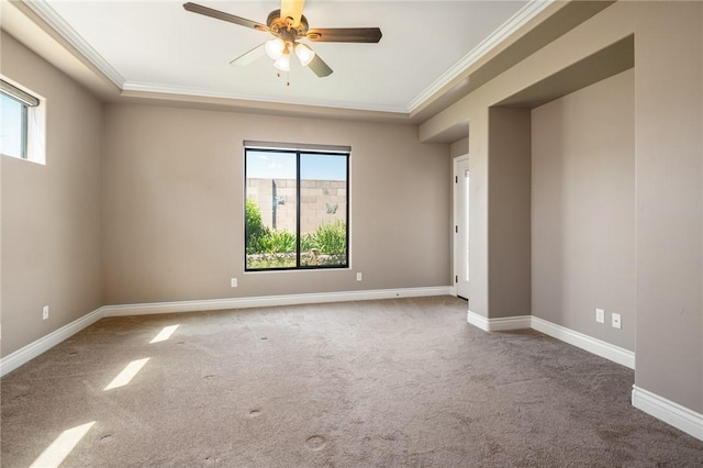 1999 Alan Ladd Dr, Kingman, AZ 86409 - empty room featuring carpet floors, ornamental molding, a raised ceiling, ceiling fan, and baseboards