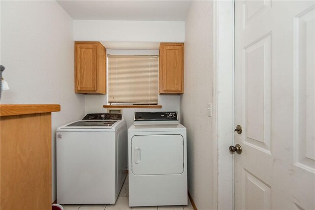 6045 S Klamath Loop, Fort Mohave, AZ 86426 - clothes washing area with separate washer and dryer, cabinet space, and light tile patterned floors