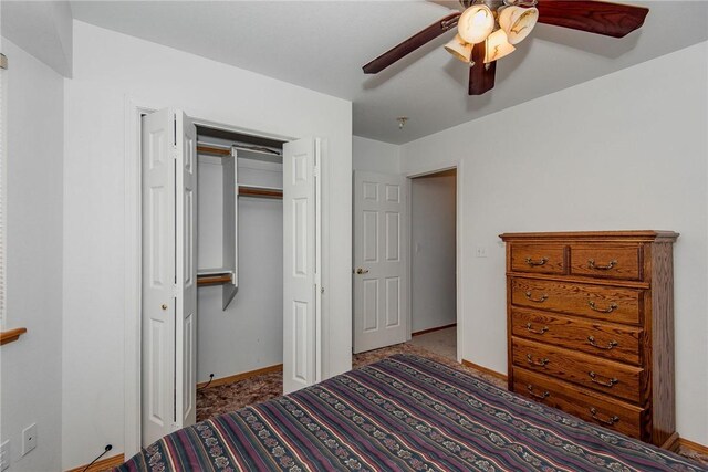 6045 S Klamath Loop, Fort Mohave, AZ 86426 - bedroom with baseboards, a closet, and a ceiling fan
