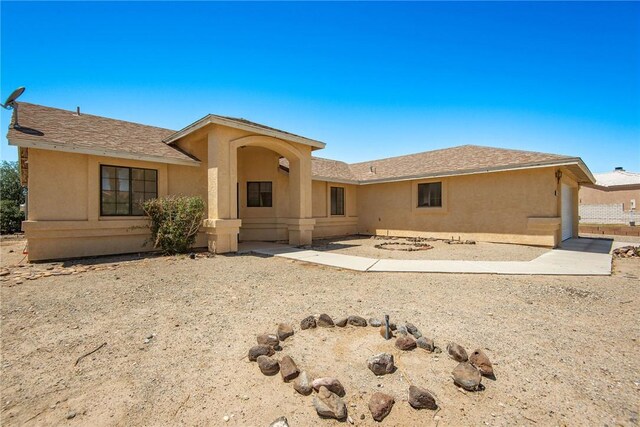 6045 S Klamath Loop, Fort Mohave, AZ 86426 - rear view of property featuring stucco siding