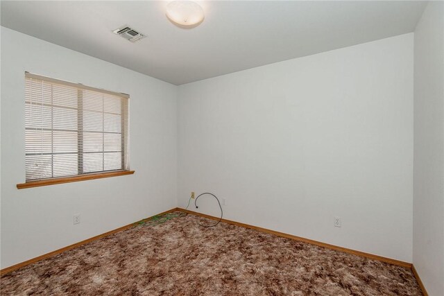 6045 S Klamath Loop, Fort Mohave, AZ 86426 - carpeted spare room featuring baseboards