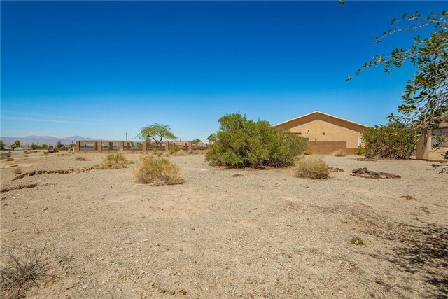 6045 S Klamath Loop, Fort Mohave, AZ 86426 - view of yard with a mountain view