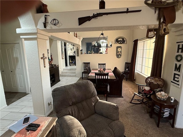 3483 Via Los Pozos, Bullhead City, AZ 86442 - living room with a chandelier and light colored carpet