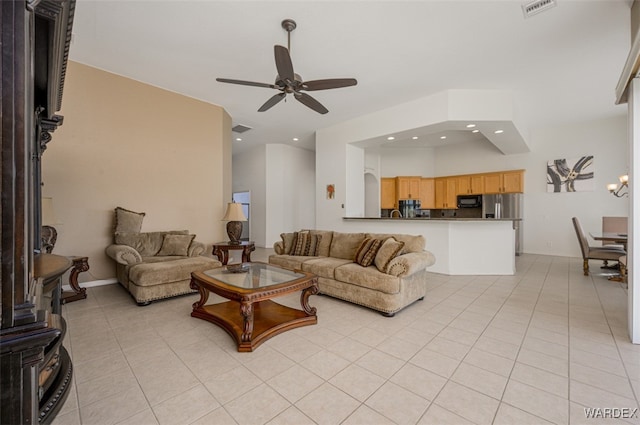 living area featuring recessed lighting, light tile patterned flooring, ceiling fan, and visible vents