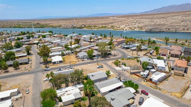 aerial view with a residential view and a water and mountain view