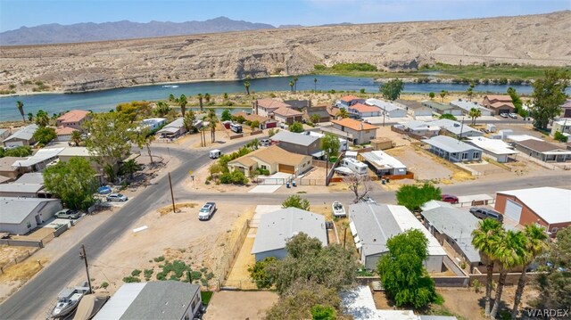 aerial view with a residential view and a water and mountain view