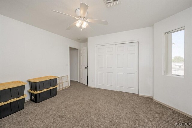 4804 S Baronsgate Way, Fort Mohave, AZ 86426 - unfurnished bedroom featuring carpet flooring, visible vents, a closet, and baseboards