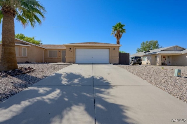 4804 S Baronsgate Way, Fort Mohave, AZ 86426 - ranch-style home featuring concrete driveway, a garage, and stucco siding