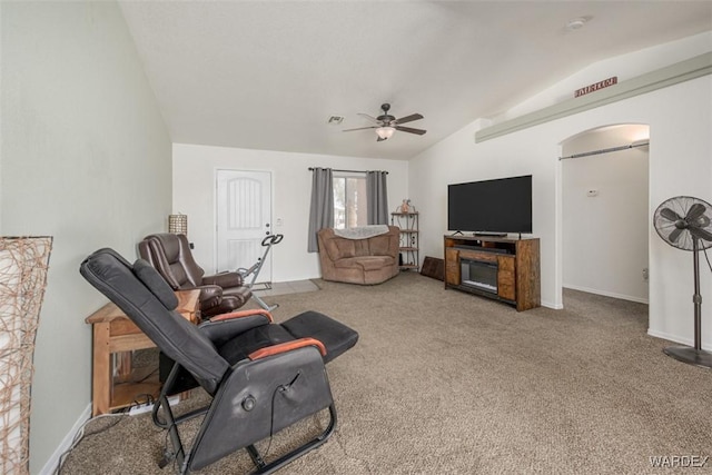 4804 S Baronsgate Way, Fort Mohave, AZ 86426 - living area with arched walkways, ceiling fan, carpet flooring, and lofted ceiling