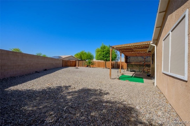 4804 S Baronsgate Way, Fort Mohave, AZ 86426 - view of yard with a fenced backyard and a pergola