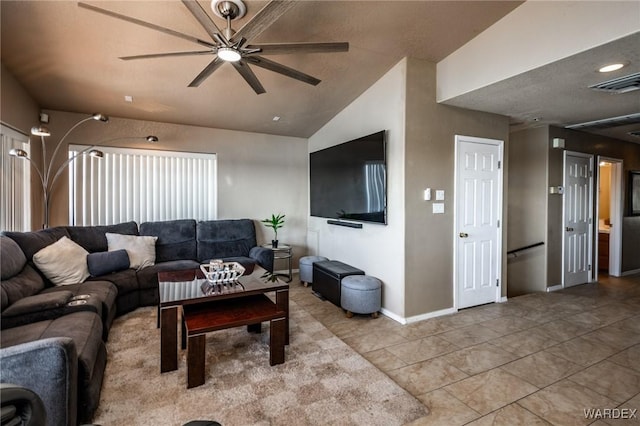 living room featuring lofted ceiling, visible vents, ceiling fan, baseboards, and tile patterned floors