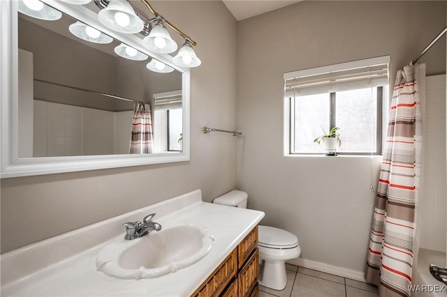 full bathroom with toilet, tile patterned flooring, vanity, and baseboards