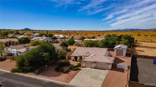 aerial view featuring a mountain view and a residential view