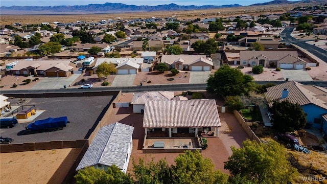 bird's eye view featuring a residential view and a mountain view