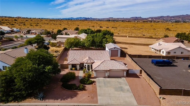 aerial view featuring a residential view and a mountain view