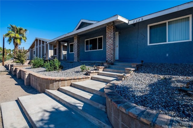 view of front of home with stucco siding