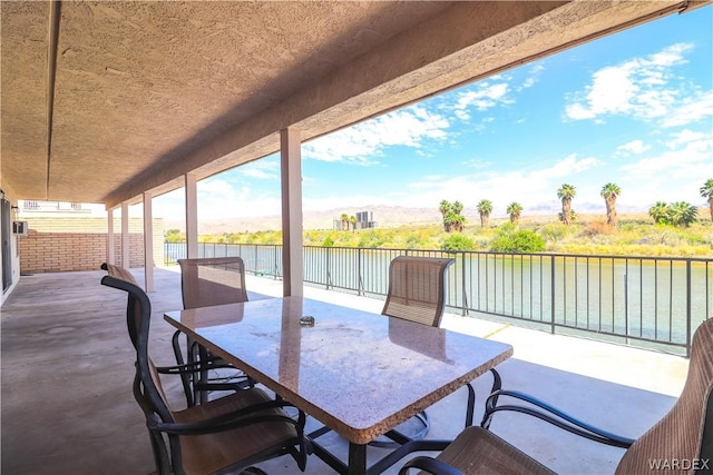 view of patio featuring outdoor dining area and a fenced backyard