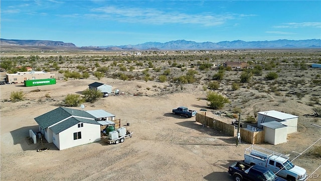 aerial view featuring view of desert and a mountain view