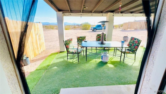 view of patio / terrace with fence