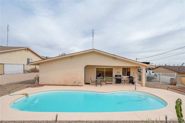 89 Keywester Dr, Lake Havasu, AZ 86403 - view of pool featuring a fenced in pool, a grill, a fenced backyard, and a patio area