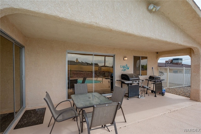 89 Keywester Dr, Lake Havasu, AZ 86403 - view of patio / terrace featuring outdoor dining area, fence, and a grill