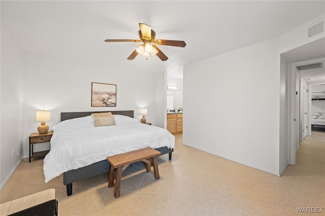 89 Keywester Dr, Lake Havasu, AZ 86403 - bedroom with visible vents, baseboards, ensuite bath, and ceiling fan