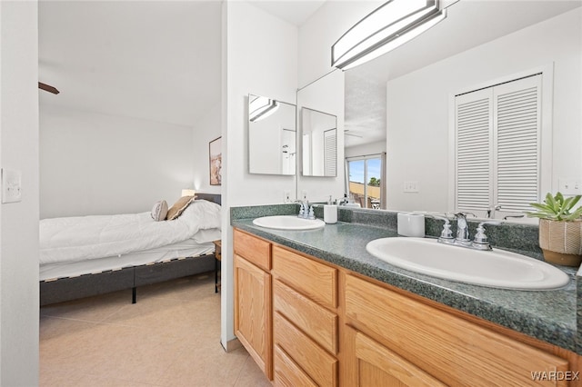 89 Keywester Dr, Lake Havasu, AZ 86403 - ensuite bathroom featuring a sink, double vanity, ensuite bathroom, and tile patterned flooring