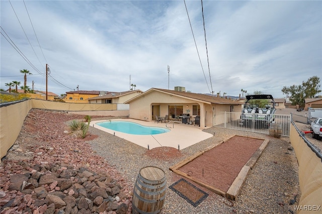 89 Keywester Dr, Lake Havasu, AZ 86403 - view of pool with a fenced in pool, a patio, a fenced backyard, and a gate