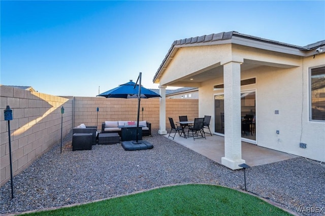 view of patio / terrace featuring a fenced backyard and outdoor lounge area