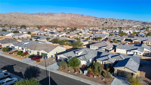 bird's eye view featuring a mountain view and a residential view