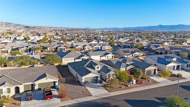 bird's eye view featuring a residential view and a mountain view