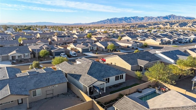 birds eye view of property featuring a residential view and a mountain view