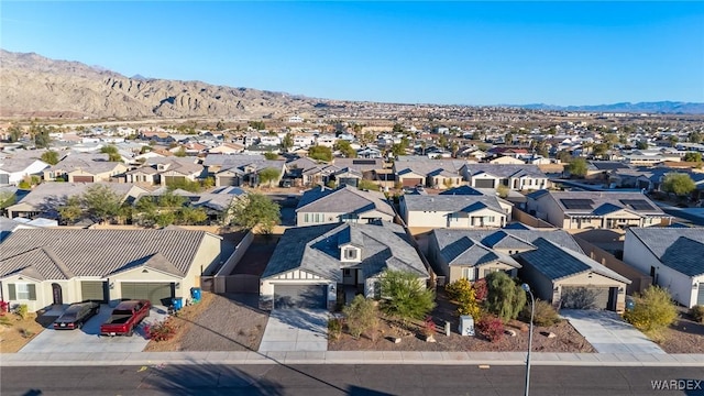 birds eye view of property featuring a residential view and a mountain view