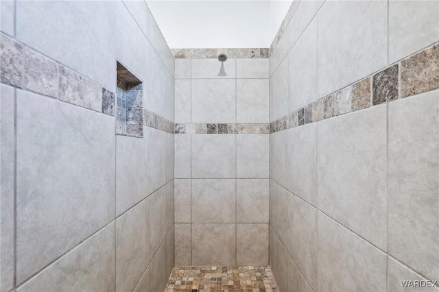 details featuring a tile shower