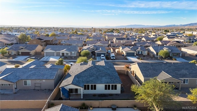 drone / aerial view with a residential view and a mountain view