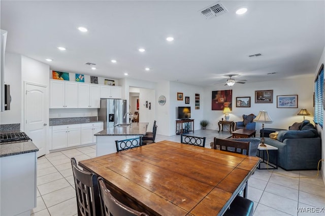 dining area with recessed lighting, visible vents, ceiling fan, and light tile patterned flooring