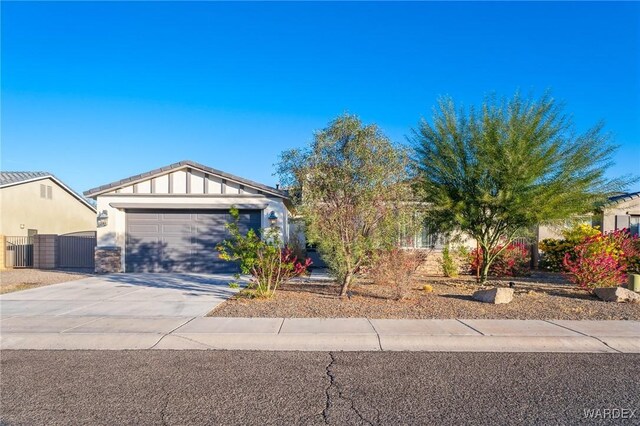 view of front facade with driveway and an attached garage