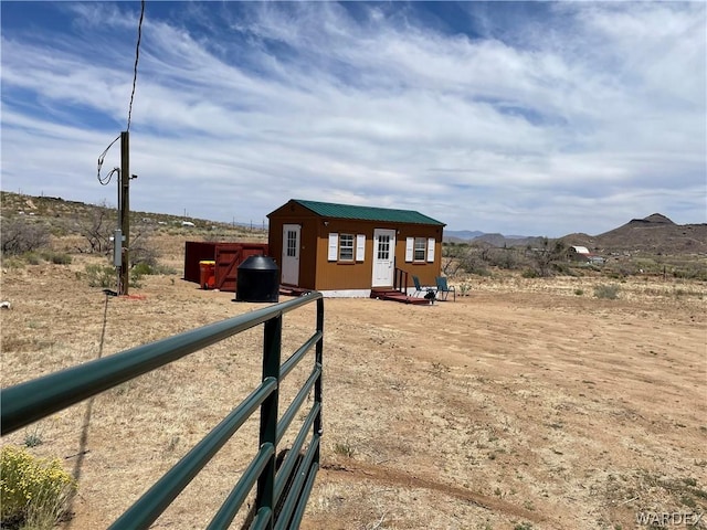 exterior space featuring a mountain view