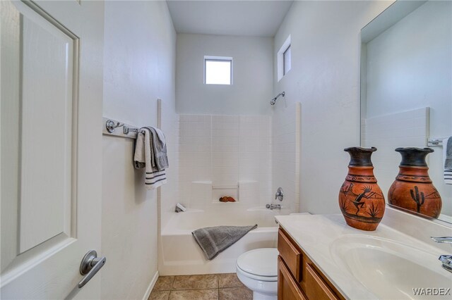 full bath with bathing tub / shower combination, vanity, toilet, and tile patterned floors