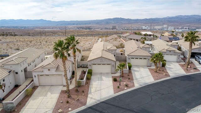 aerial view featuring a residential view and a mountain view