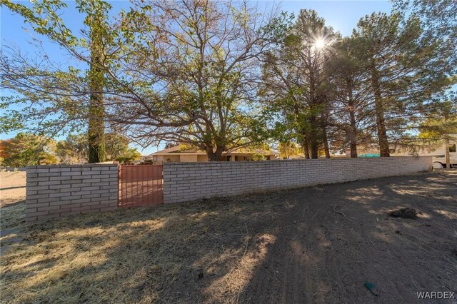 view of yard with fence