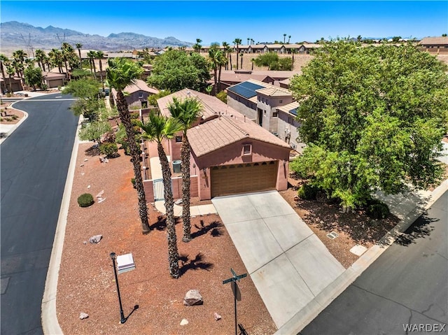 bird's eye view featuring a residential view and a mountain view