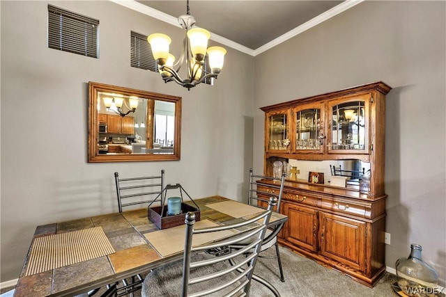 dining room with light carpet, baseboards, visible vents, crown molding, and a notable chandelier